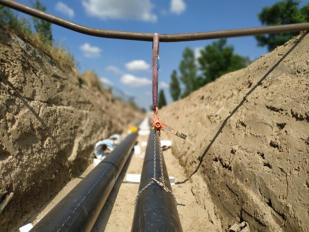 district-heating-pipes-chain-hoist-dig-near-berlin_1048944-23194246 district-heating-pipes-chain-hoist-dig-near-berlin_1048944-23194246