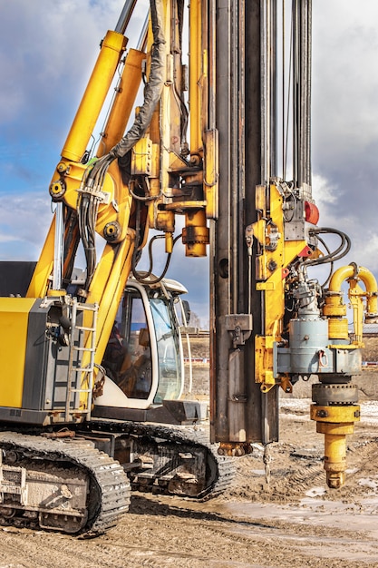 powerful-hydraulic-drilling-rig-construction-site-installation-bored-piles-by-drilling-pile-foundations-drilling-ground_331695-1925 powerful-hydraulic-drilling-rig-construction-site-installation-bored-piles-by-drilling-pile-foundations-drilling-ground_331695-1925